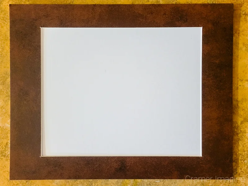 Photo of an empty hinged single brown mat on a table