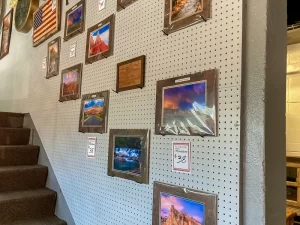 Cramer Imaging landscape photo prints on the wall for sale at Rocky Mountain Furniture store in Cedar City, Utah