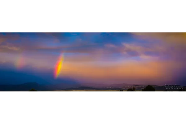 Cramer Imaging's fine art landscape photograph of a double rainbow arc against a dramatic sunset sky in Panguitch, Utah