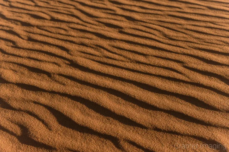 Audrey Cramer Photography's fine art nature photograph of waves and shadows in the sand dunes