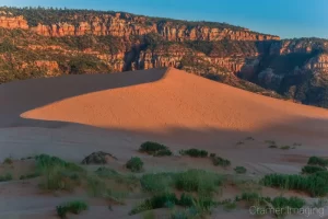 Cramer Imaging's fine art landscape photograph of sunset over a sand dune at Coral Pink Sand Dunes State Park Utah