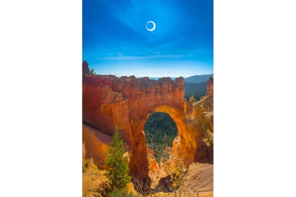 Audrey Cramer Photography's fine art landscape photograph of an annular eclipse or ring of fire over Bryce Canyon's Natural Bridge formation