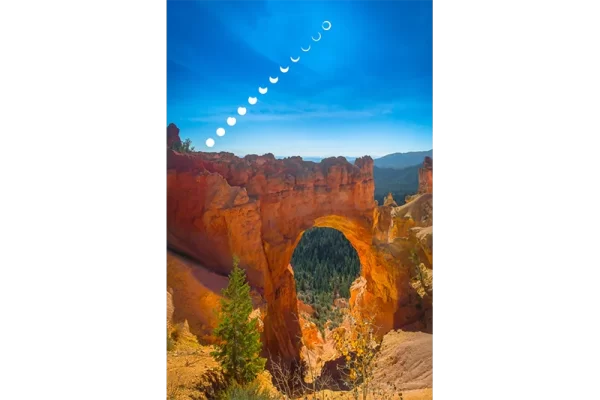 Cramer Imaging's fine art landscape photograph of an annular eclipse or ring of fire time-lapse over Bryce Canyon's Natural Bridge formation