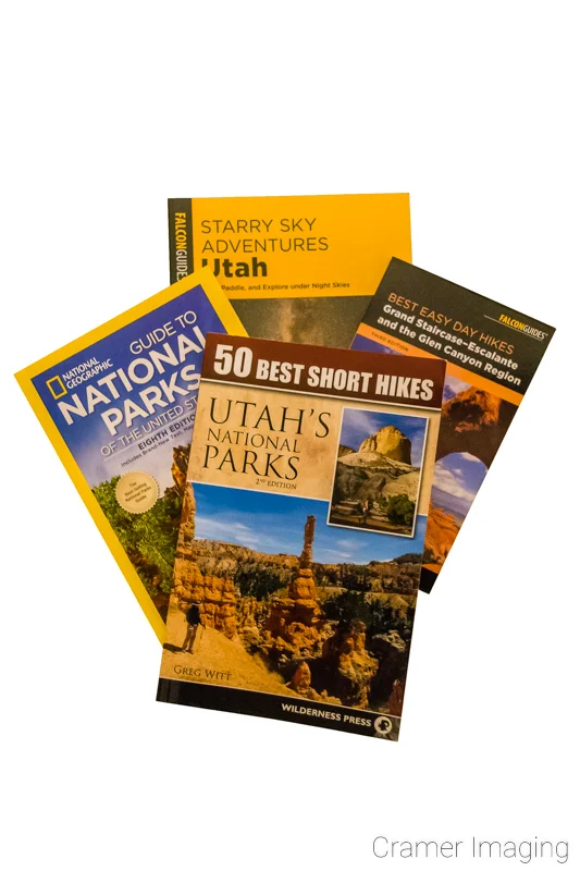 Photograph of some hiking and photography guides for locations in Utah and US national parks