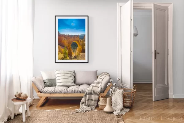 Photograph of Cramer Imaging's landscape photo "Centennial Ring of Fire" in a cozy neutral-toned living room