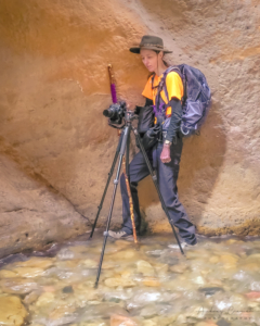 Photo of landscape photography Audrey Cramer at Kanarraville Falls checking a shot