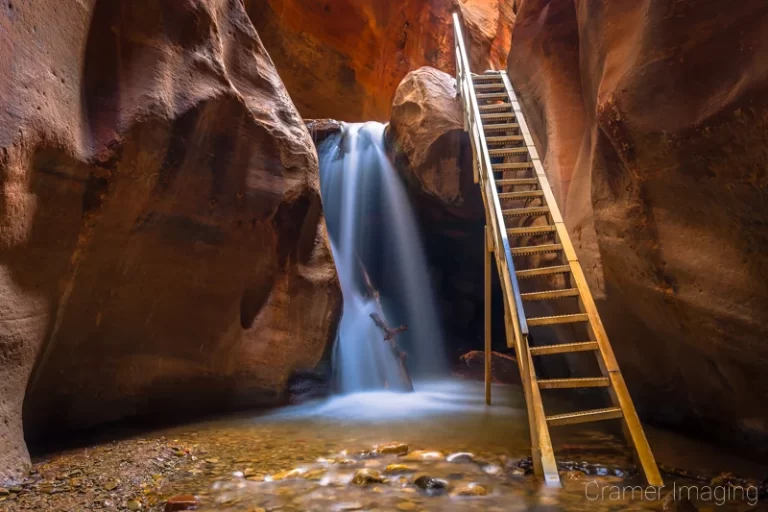 Cramer Imaging's fine art landscape photograph of Kanarra Falls near Kanarraville Utah with silky water and the ladder