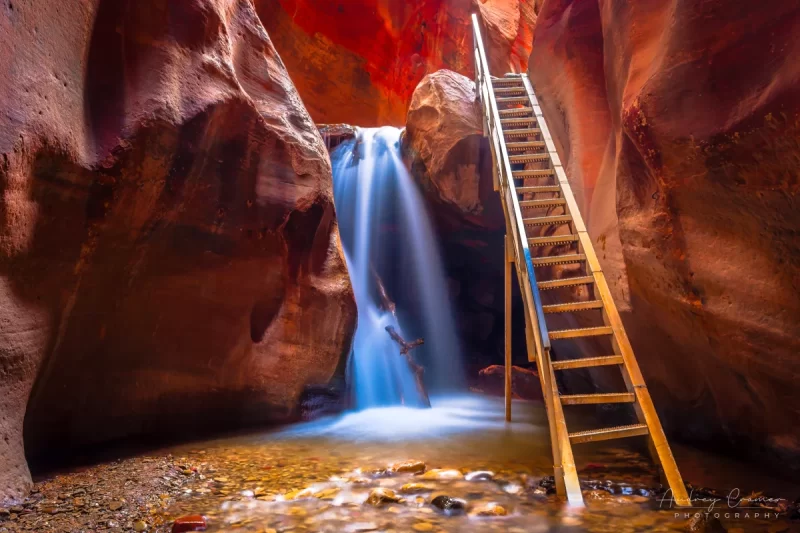 Audrey Cramer Photography's fine art landscape photograph of Kanarra Falls near Kanarraville Utah with silky water and the ladder