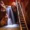 Cramer Imaging's fine art landscape photograph of Kanarra Falls near Kanarraville Utah with silky water and the ladder