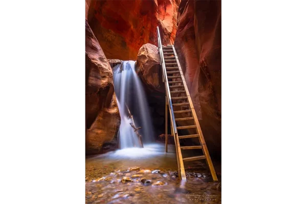 Audrey Cramer Photography's fine art landscape photograph of Kanarra Falls near Kanarraville Utah with silky water and the ladder