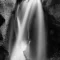 Cramer Imaging's fine art landscape close-up monochrome or black and white photograph of Kanarra Falls near Kanarraville Utah with silky water