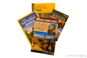 Photograph of some hiking and photography guides for locations in Utah and US national parks