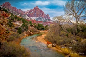 Audrey Cramer Photography's fine art landscape photograph of the Watchman mountain and Virgin River in winter at Zion National Park Utah