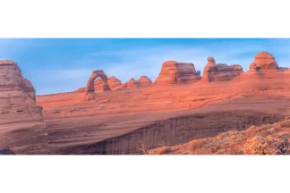 Cramer Imaging's fine art landscape panorama photograph of Delicate Arch at sunset in Arches National Park, Utah