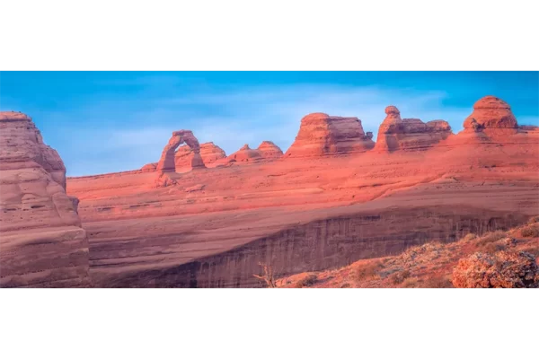 Cramer Imaging's fine art landscape panorama photograph of Delicate Arch at sunset in Arches National Park, Utah