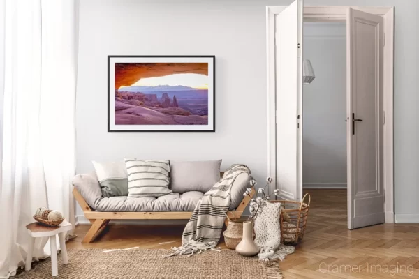 Photograph of Cramer Imaging's landscape photo "Mesa Arch" in a cozy neutral-toned living room