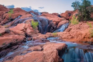 Fine art landscape photograph of silky water flowing down the waterfall of Gunlock State Park, Utah by Audrey Cramer Photography