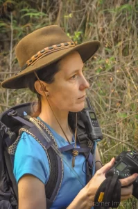 Landscape photographer Audrey Cramer stopping to consider the scene for a photo