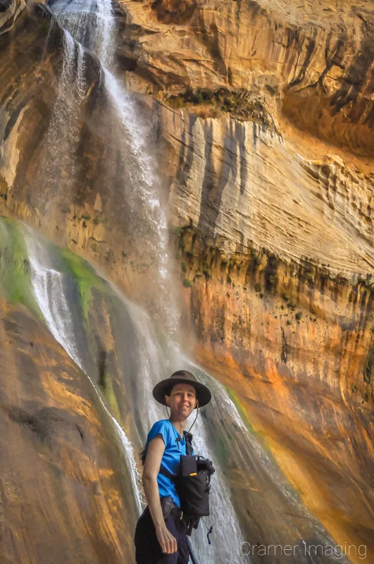 Photo of landscape photographer Audrey Cramer at Lower Calf Creek Falls in Escalante National Monument, Utah