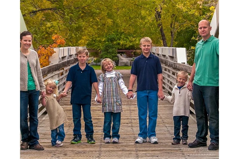 Example of a bad crop job on a family portrait photograph