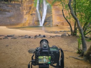 Audrey Cramer Photography's photograph of a camera on a tripod taking a Lower Calf Creek Falls picture at Escalante National Monument, Utah