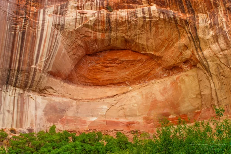 Audrey Cramer Photography's fine art landscape photograph of an eye-shaped formation in a rock wall at Escalante National Monument, Utah