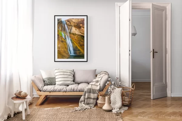 Photograph of Cramer Imaging's landscape photo "Lower Calf Creek Falls" in a cozy neutral-toned living room