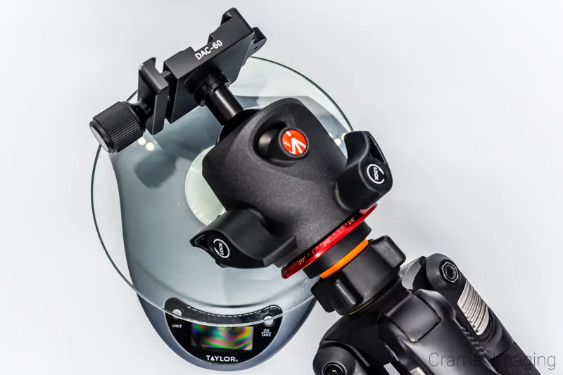 Cramer Imaging's photo of the Manfrotto XPRO ballhead tripod head on a scale to weigh it