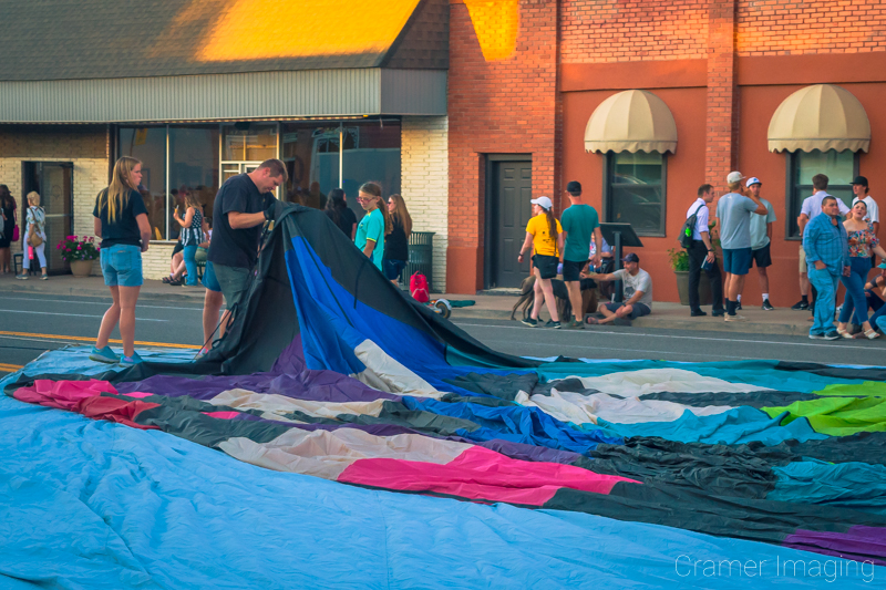 Audrey Cramer Photography's fine art photograph of a hot air balloon team preparing a balloon for a balloon glow in Panguitch, Utah