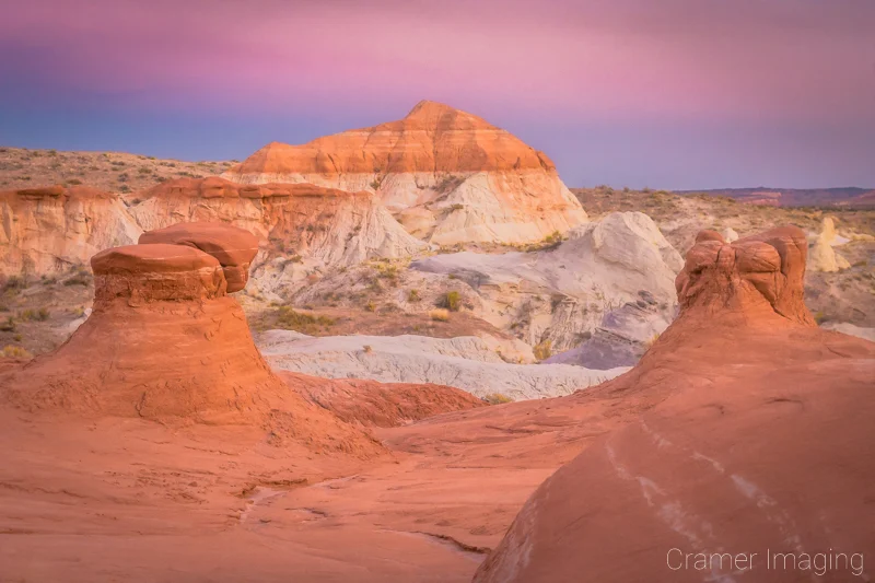 Audrey Cramer Photography's fine art landscape photograph of toadstool-like hoodoos and colored layers of sandstone in Escalante National Monument, Utah