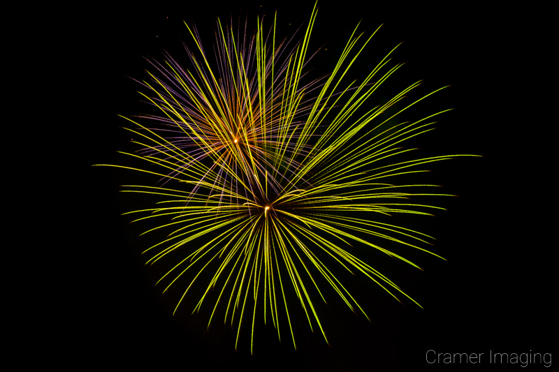 Audrey Cramer Photography's fine art photograph of cool-toned fireworks in the sky