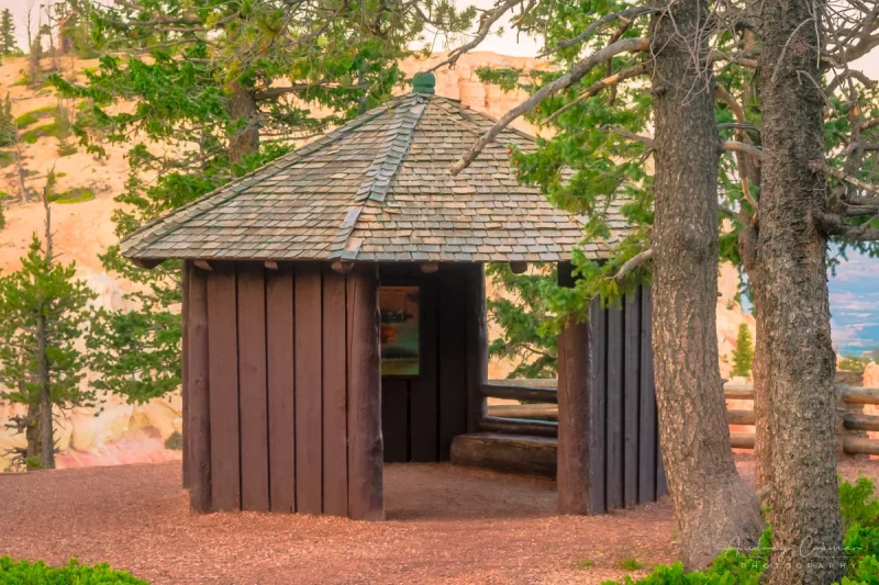 Audrey Cramer Photography's fine art landscape photograph of a remote gazebo and pine trees at Bryce Canyon National Park, Utah at sunset