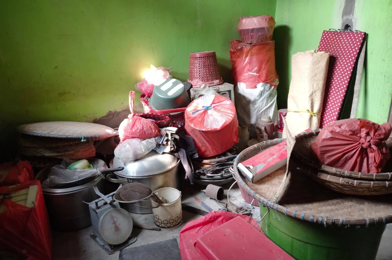 Photo of a room piled up with clutter and junk