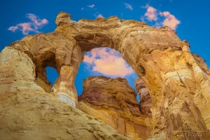 Audrey Cramer Photography's fine art landscape photo close-up of the Grosvenor double arch at sunset in Escalante National Monument, Utah